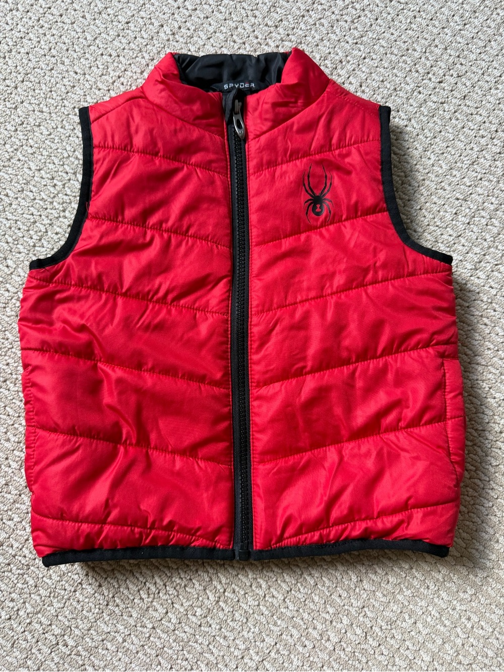 Spyder Kids red insulated puffer vest and black matching sweatpants. - Picture 2 of 6